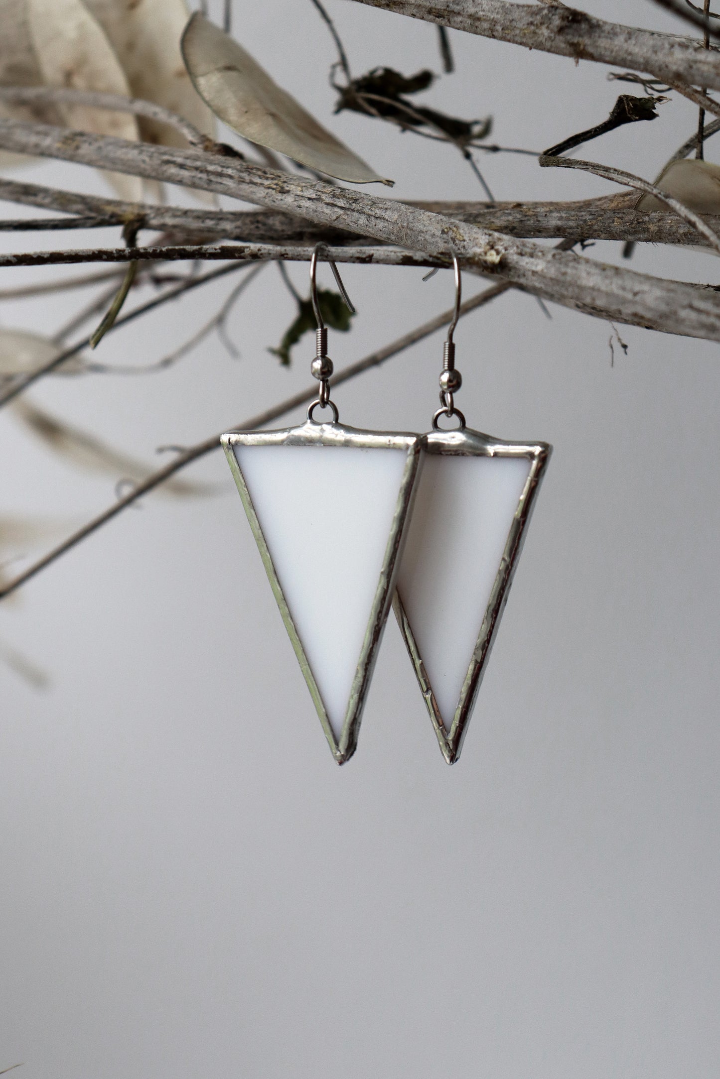 Triangle dangling earrings
