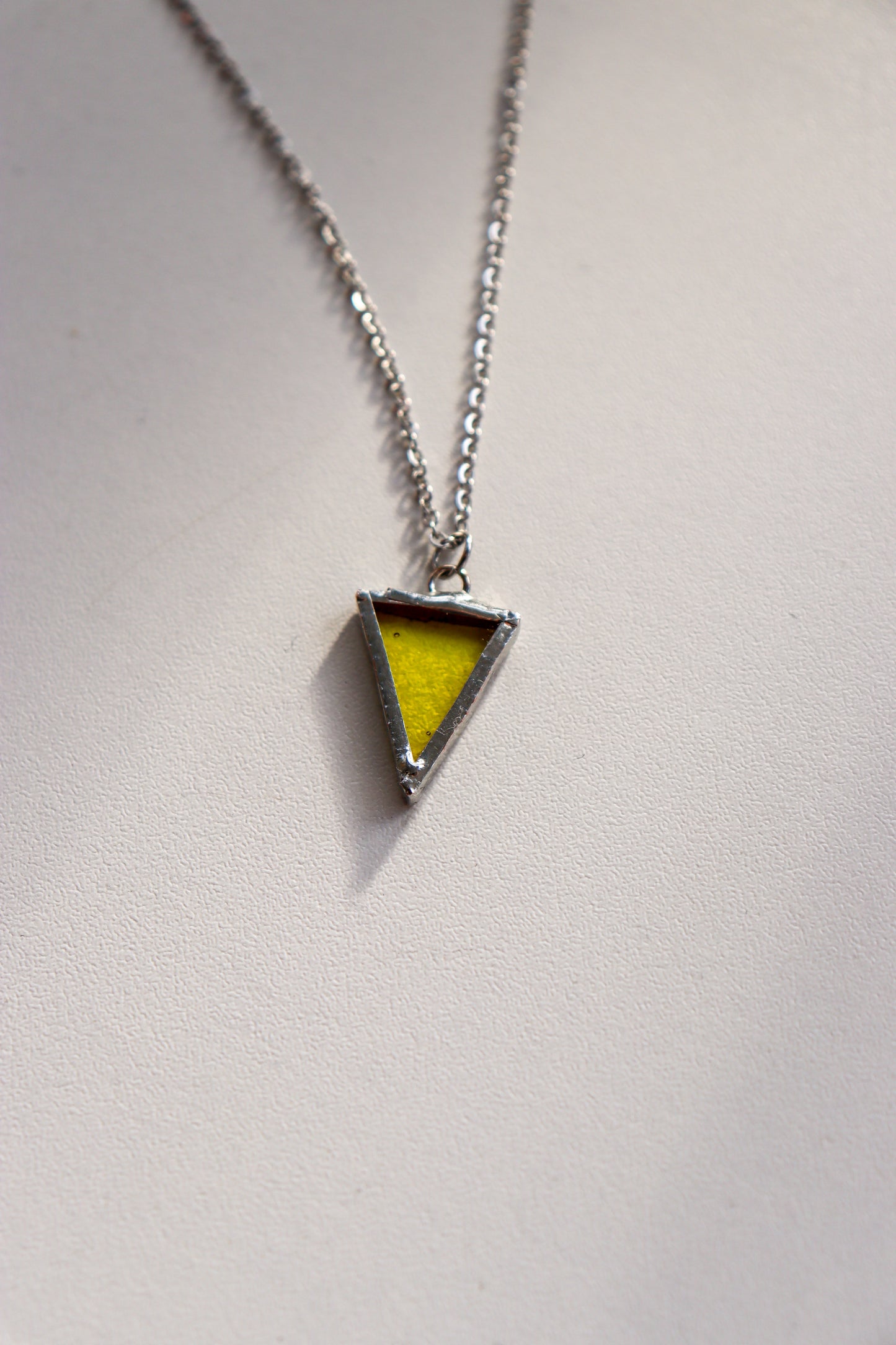 Small triangle necklaces