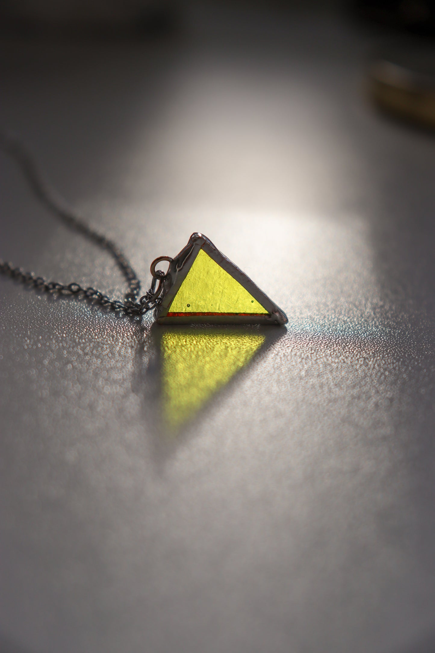 Small triangle necklaces