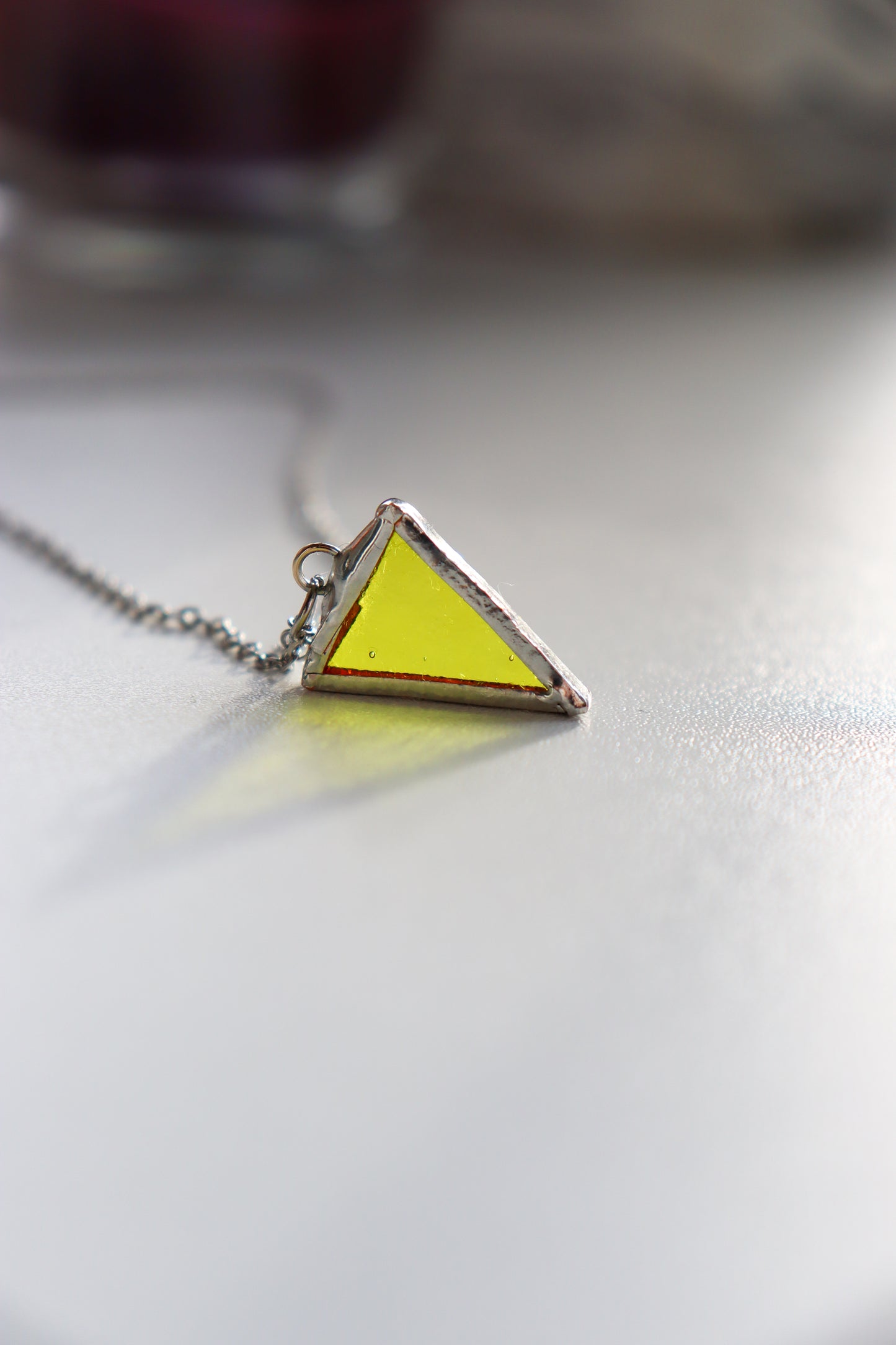 Small triangle necklaces