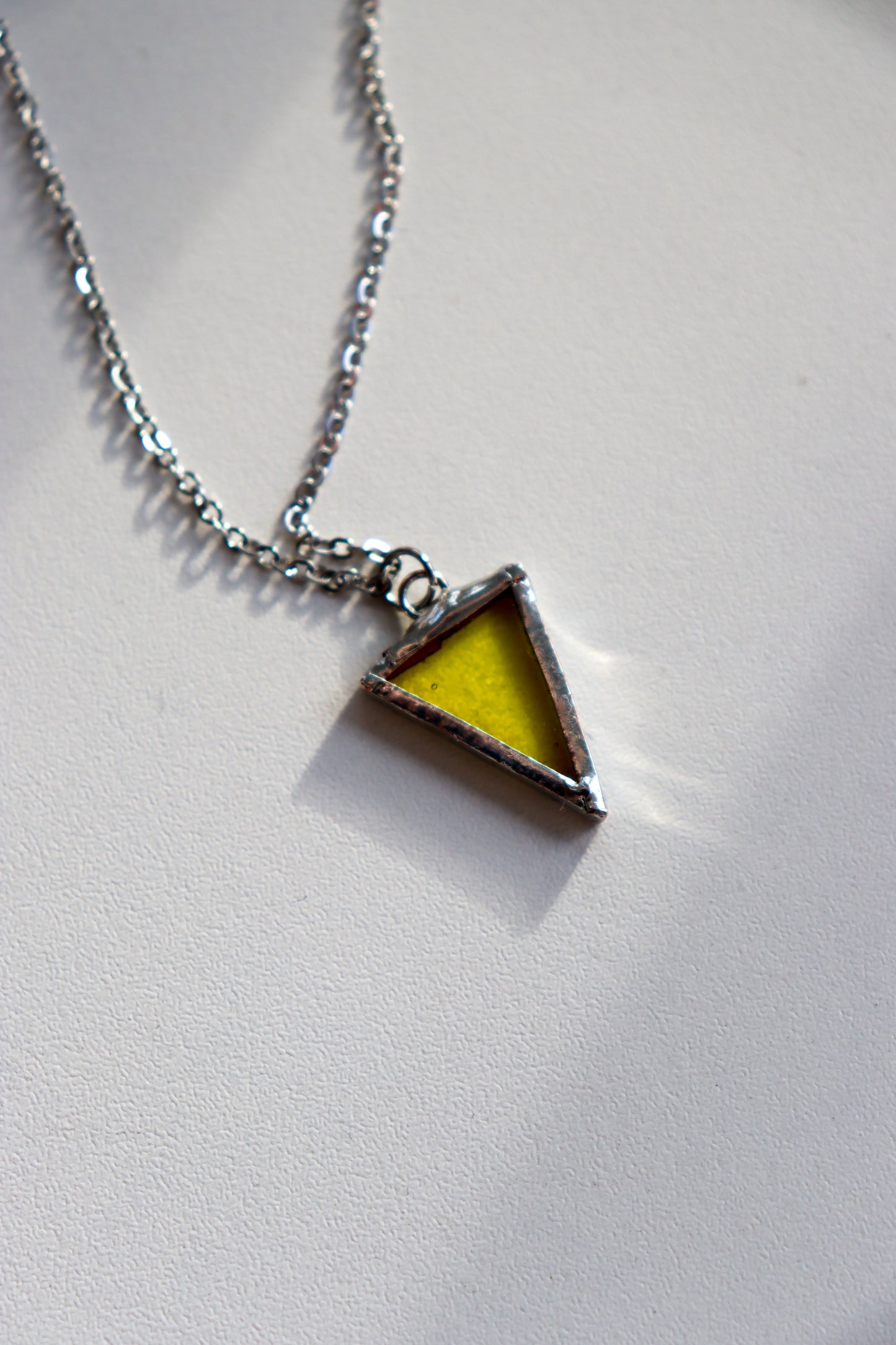 Small triangle necklaces