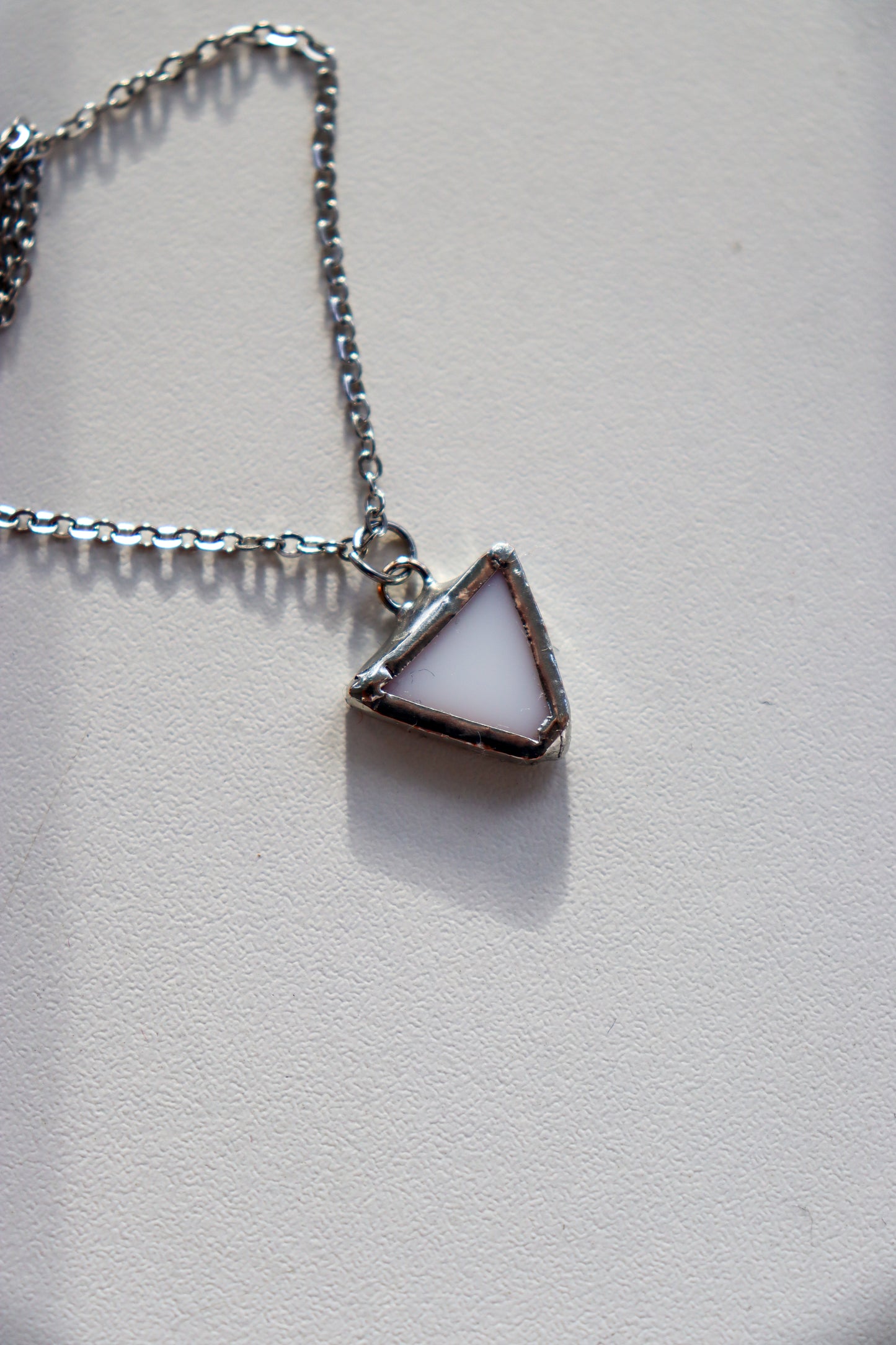 Small triangle necklaces