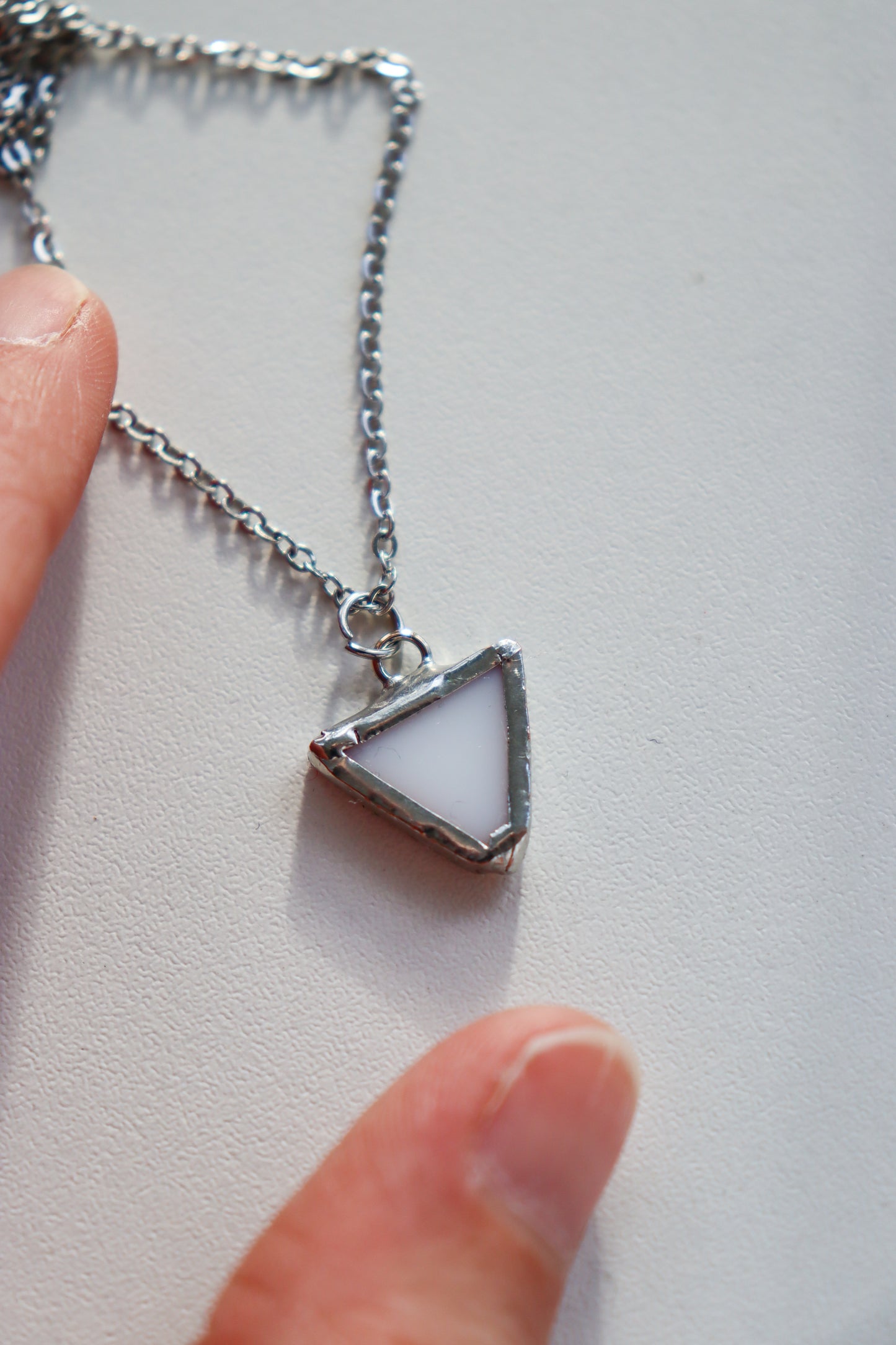 Small triangle necklaces