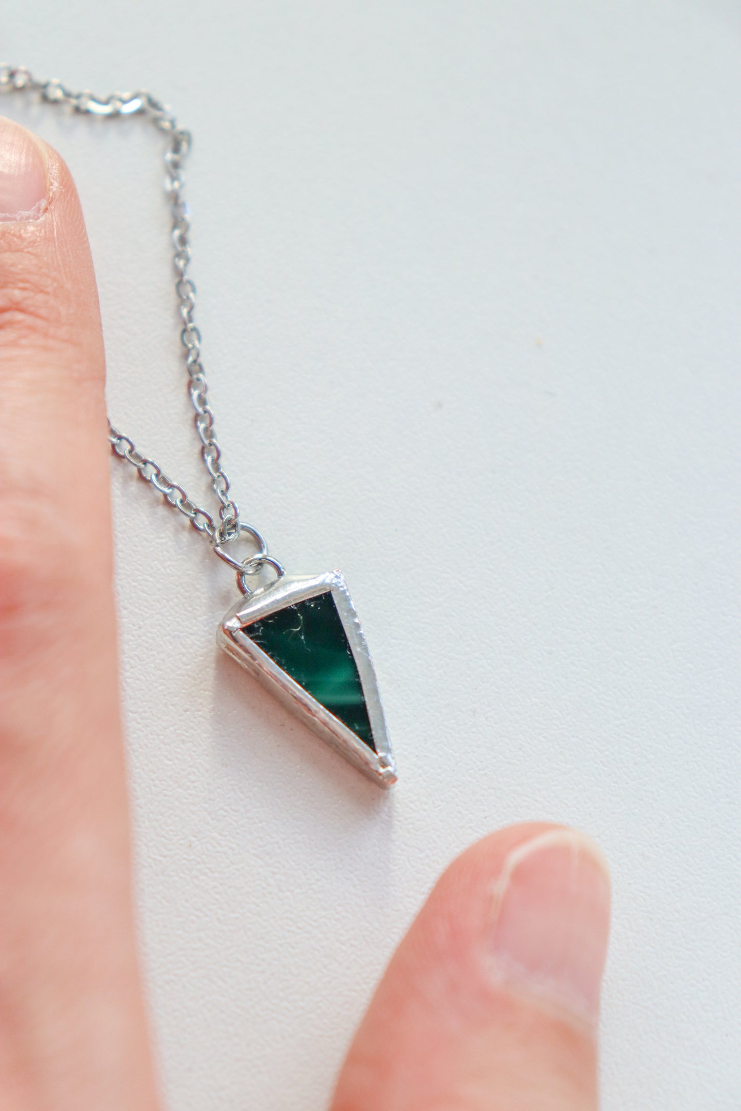 Small triangle necklaces