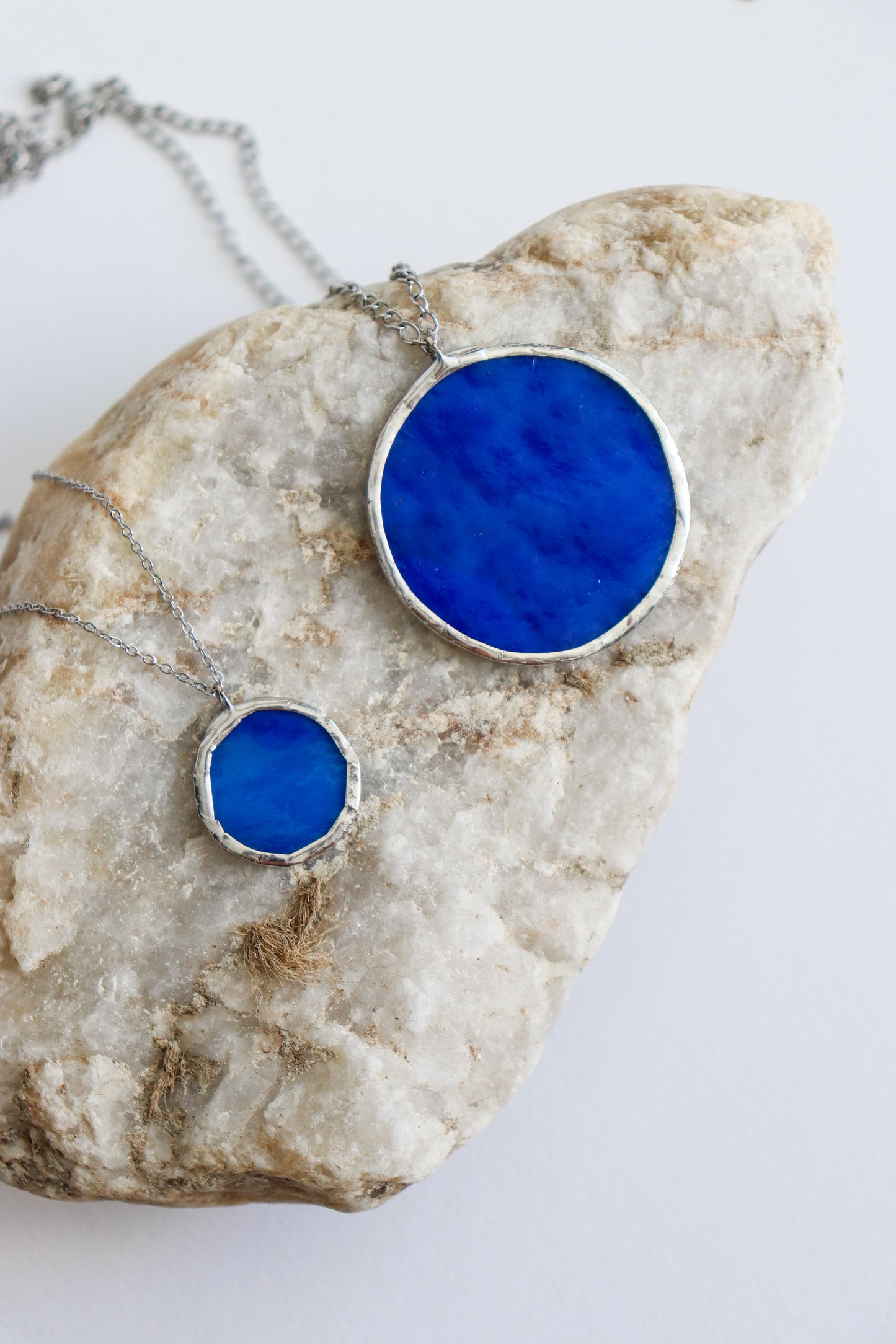 Dark blue circle necklaces