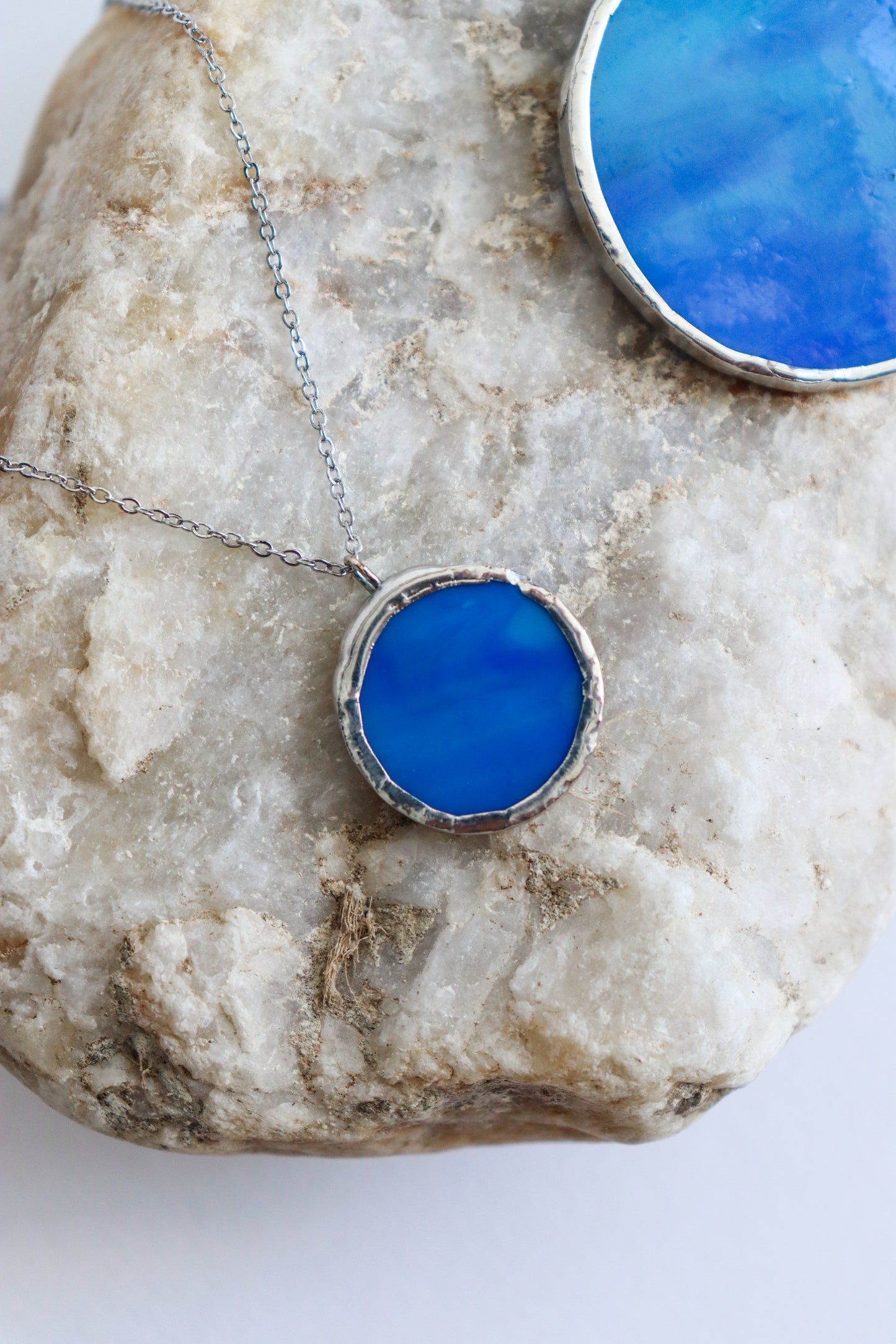 Dark blue circle necklaces