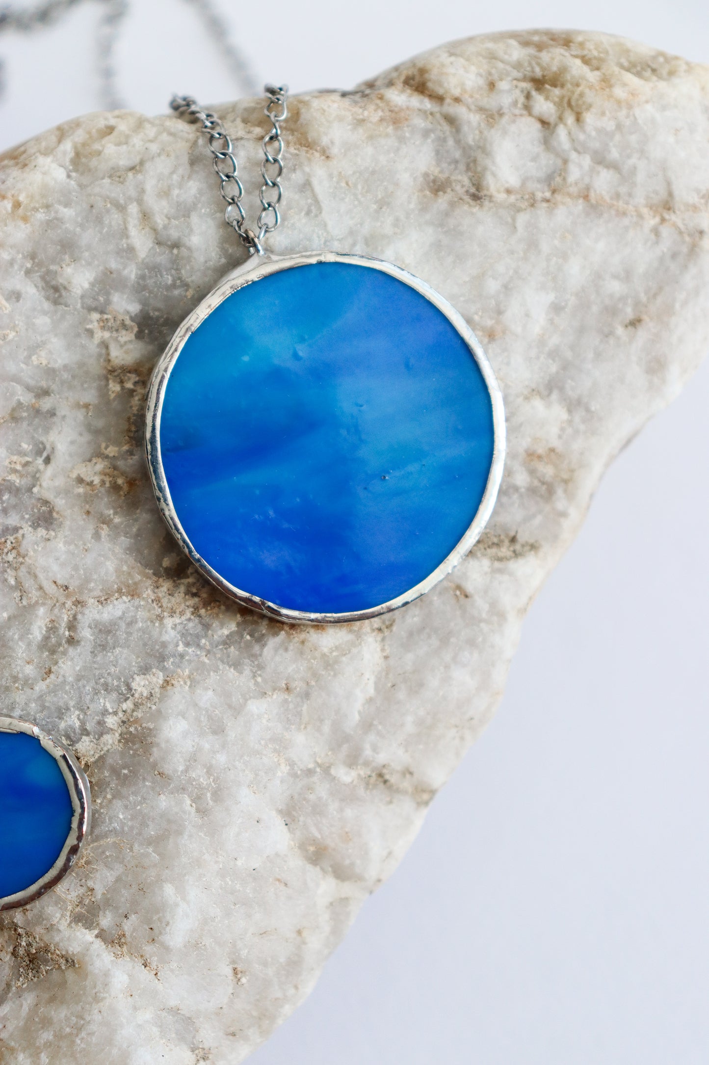 Dark blue circle necklaces