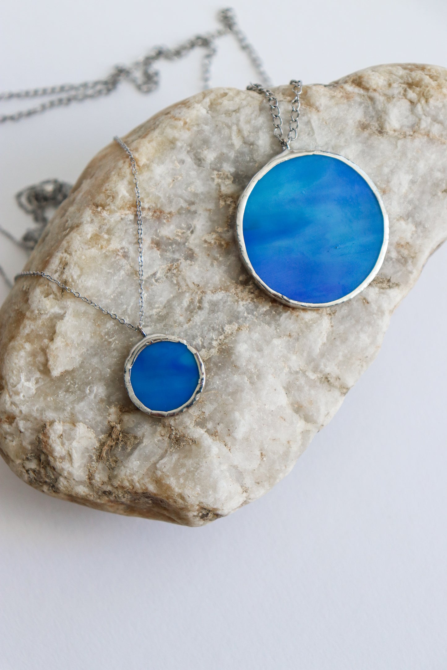 Dark blue circle necklaces