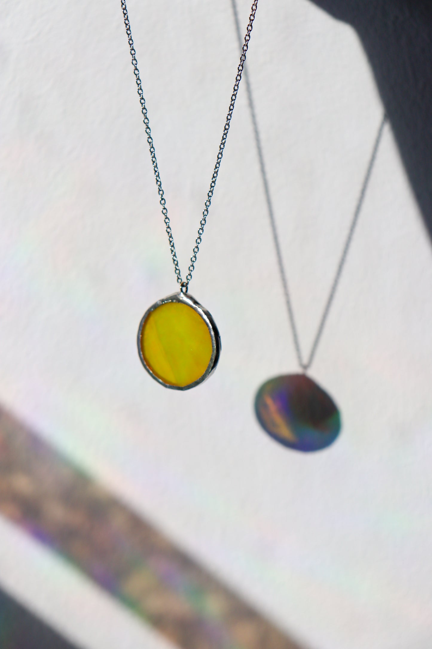 Iridescent yellow necklaces