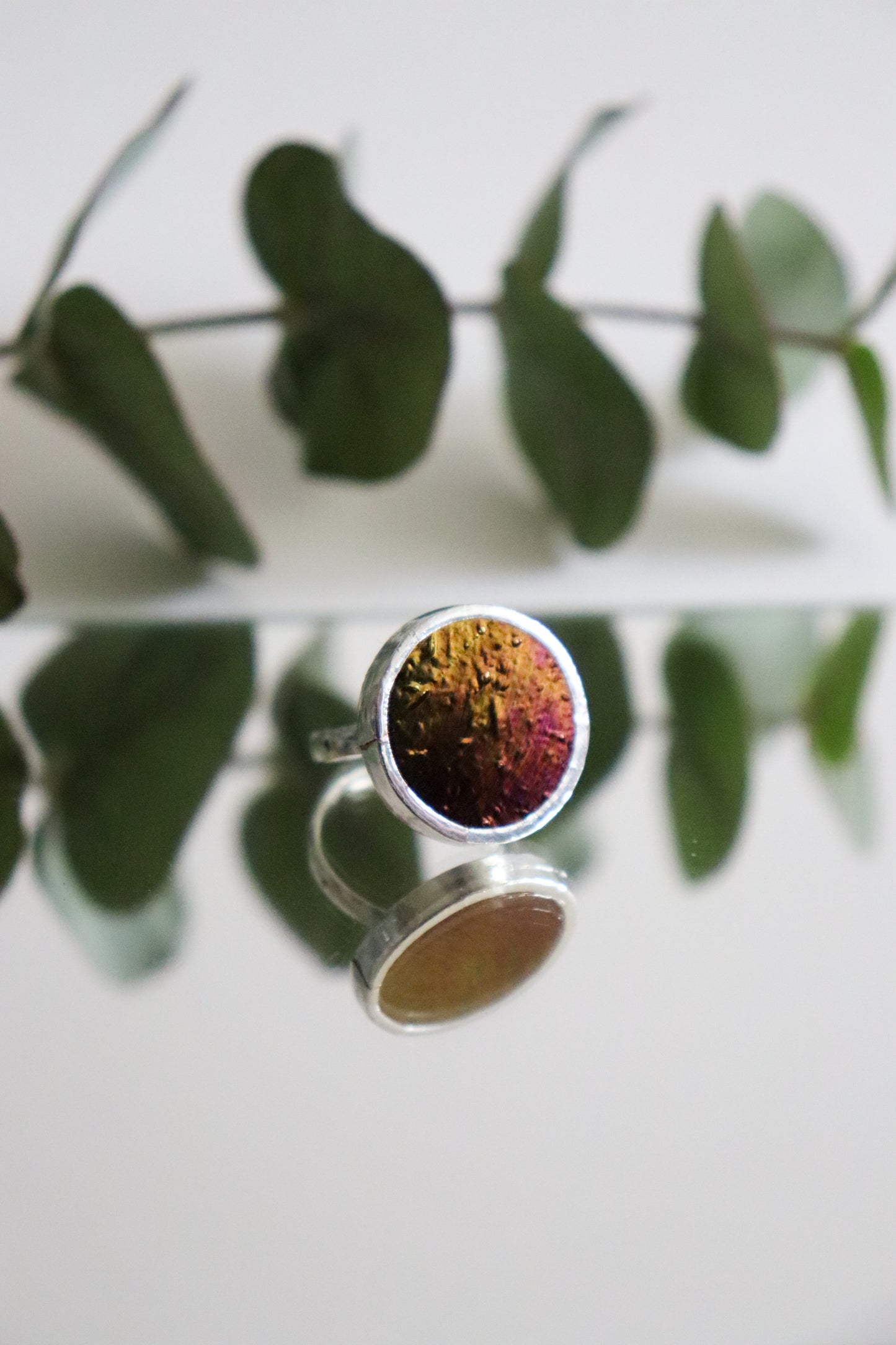 Iridescent black circle rings