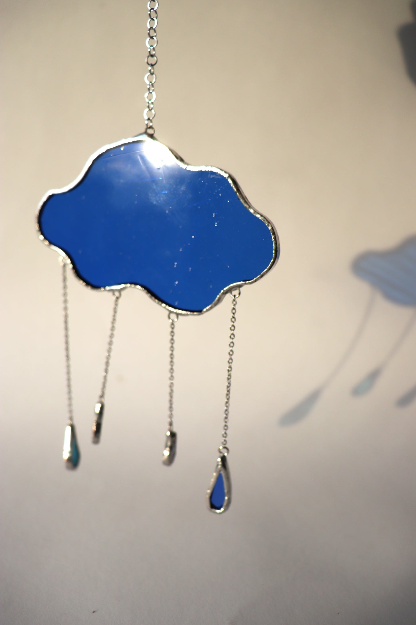 Suncatcher / Small rainy clouds