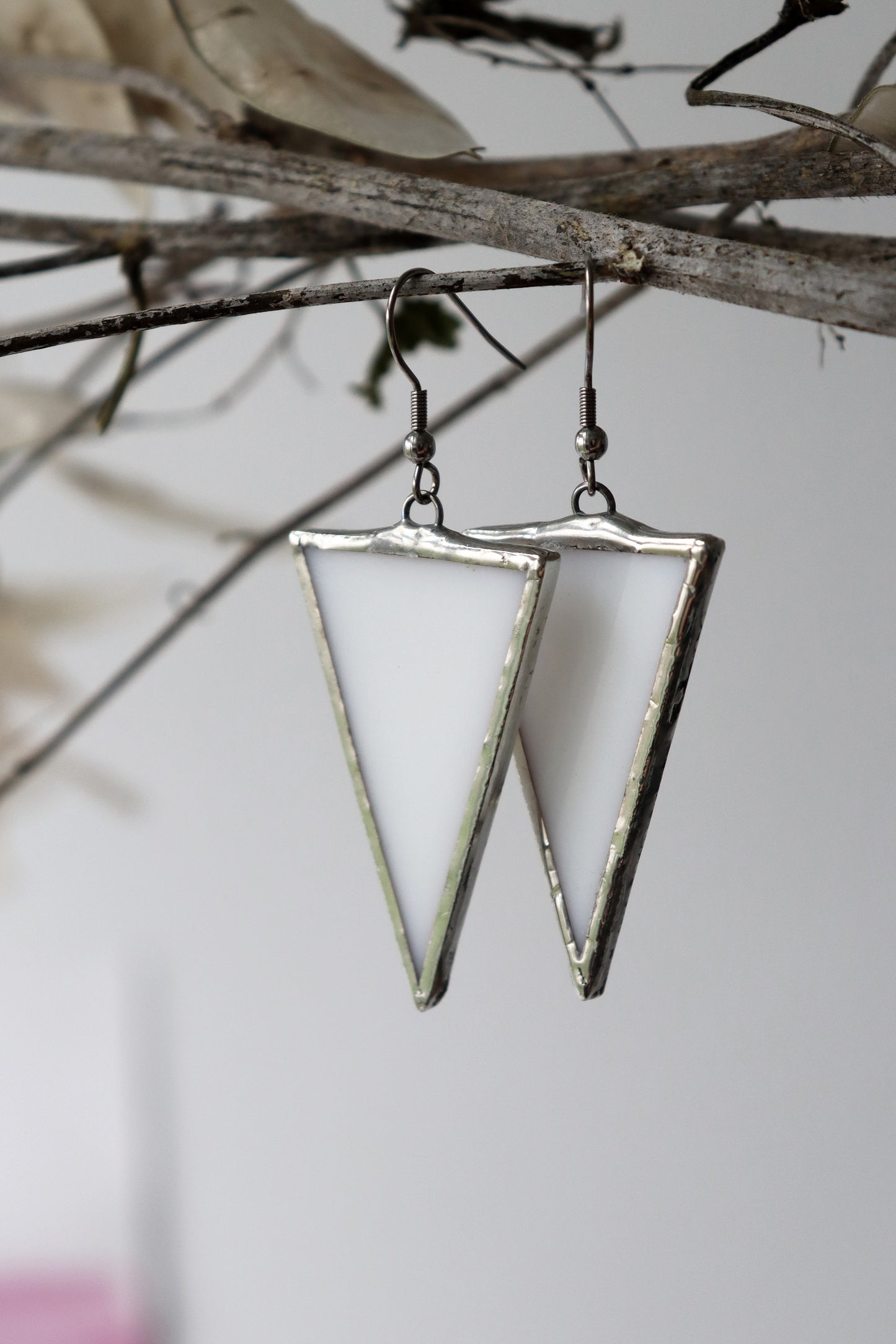 Triangle dangling earrings