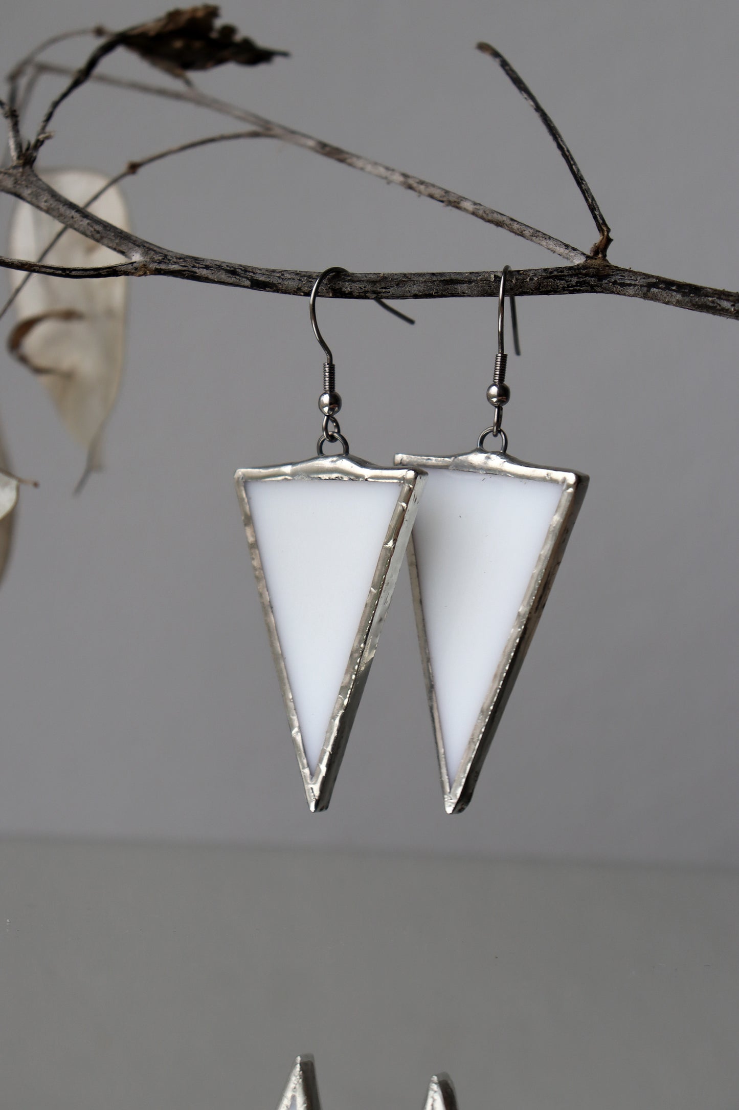 Triangle dangling earrings