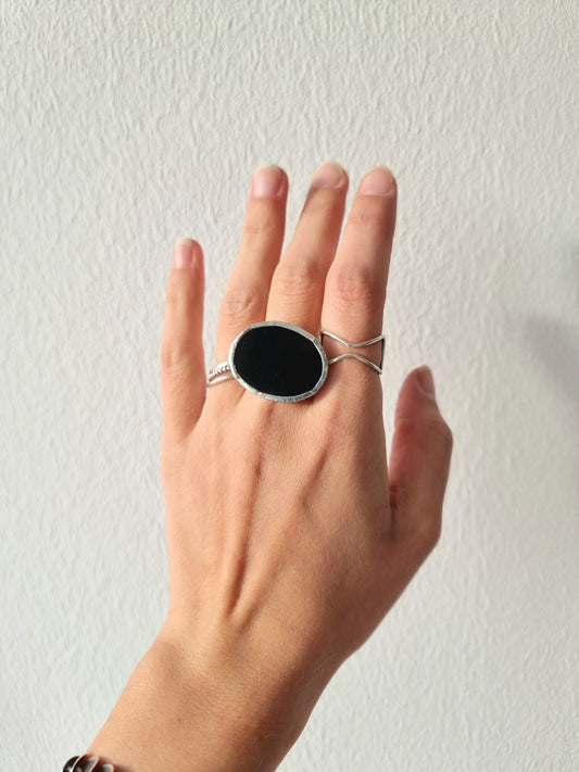 Black oval ring