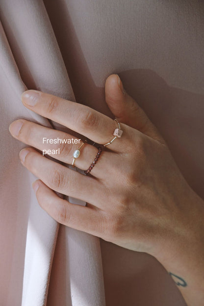 Stackable semi-precoius rings