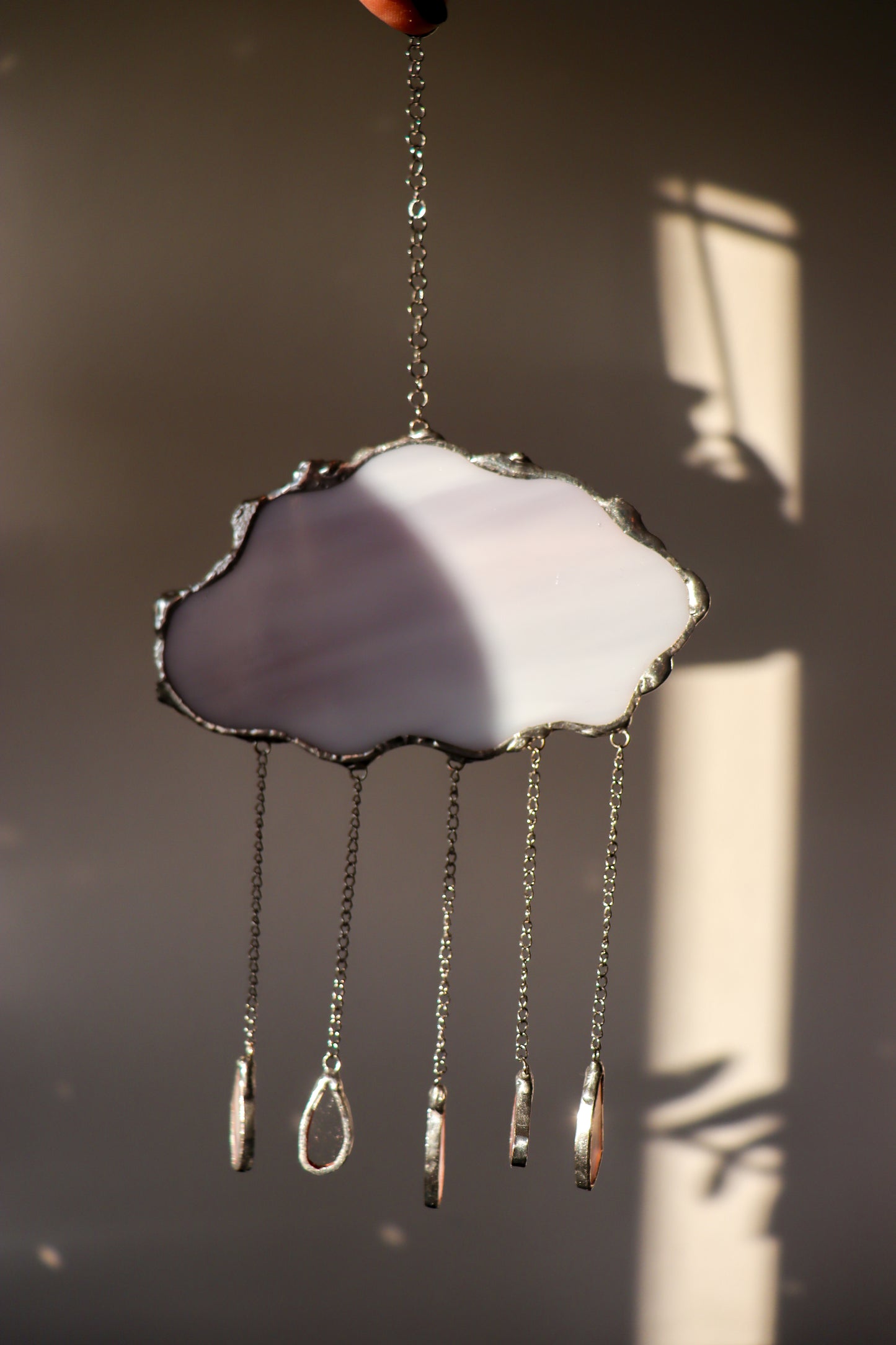 Suncatcher / Small rainy clouds