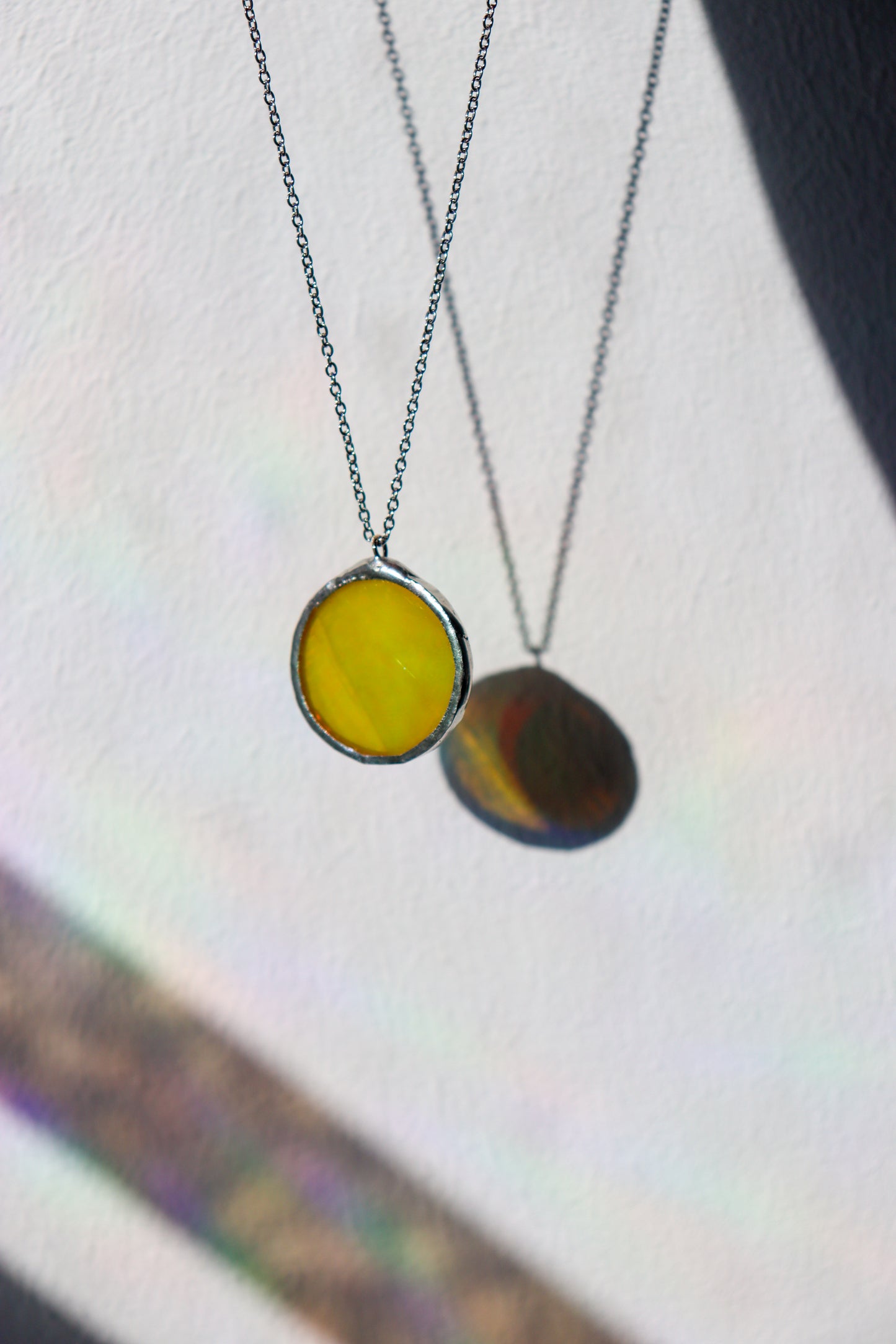 Iridescent yellow necklaces