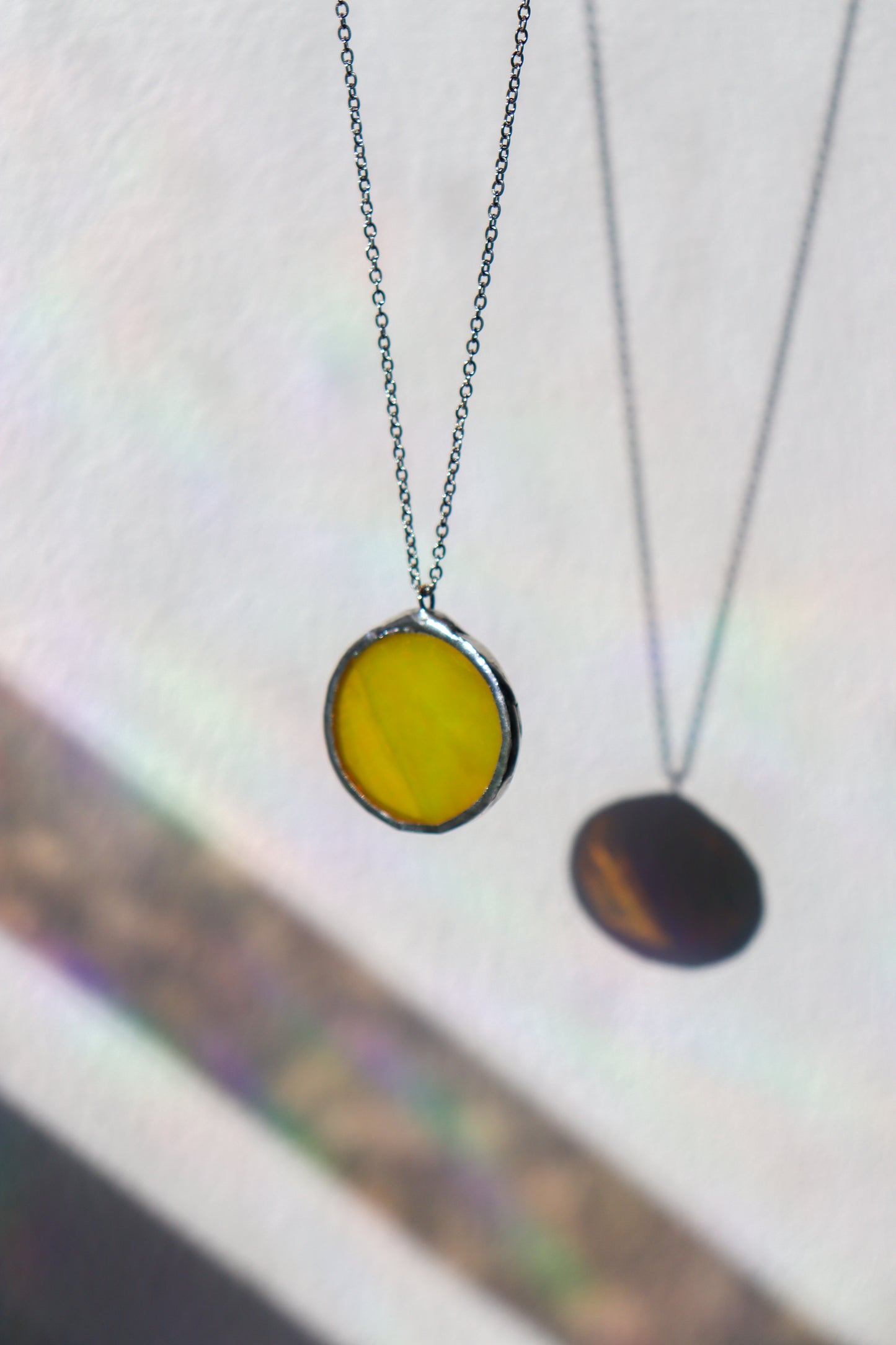 Iridescent yellow necklaces