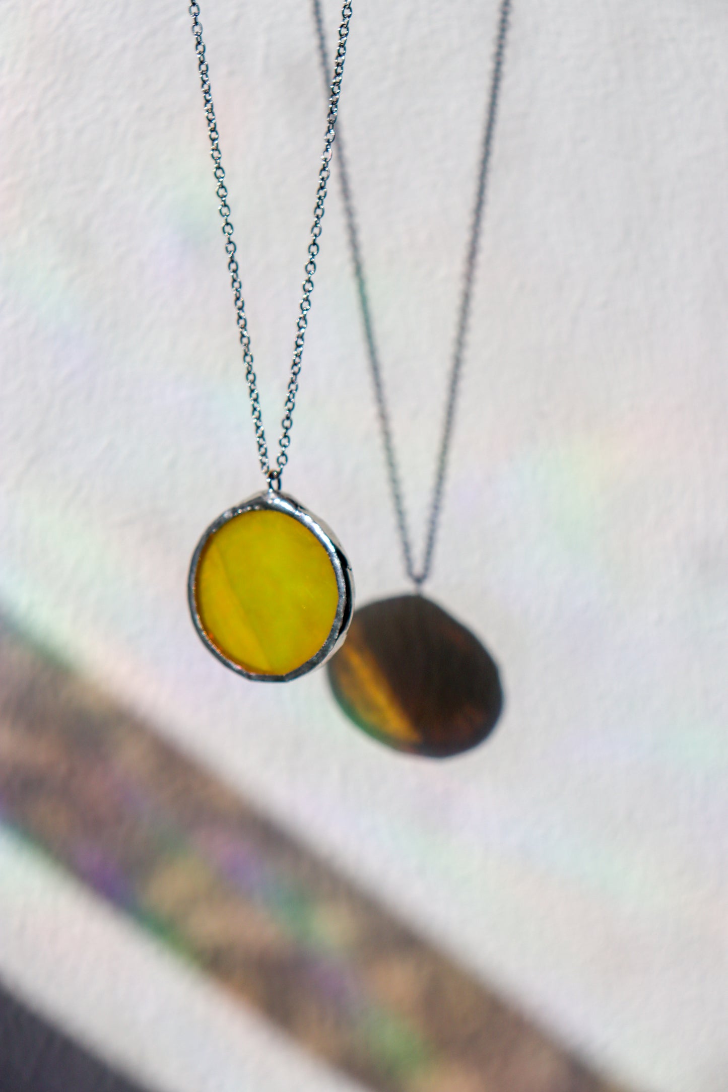Iridescent yellow necklaces