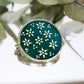 Circle brooches