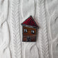 House brooch